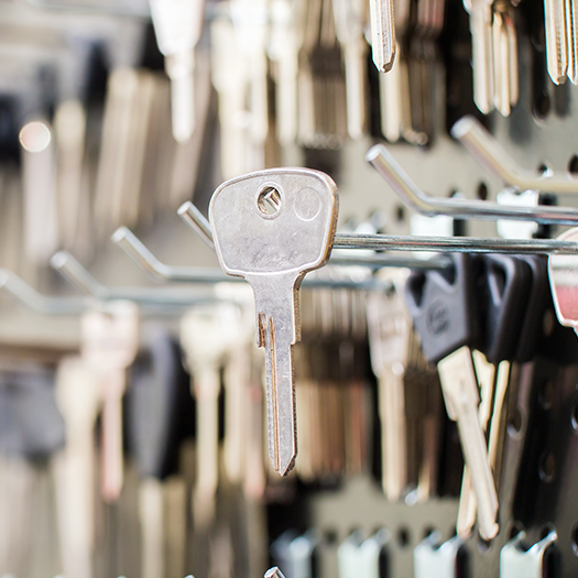 Blank keys hanging on rack